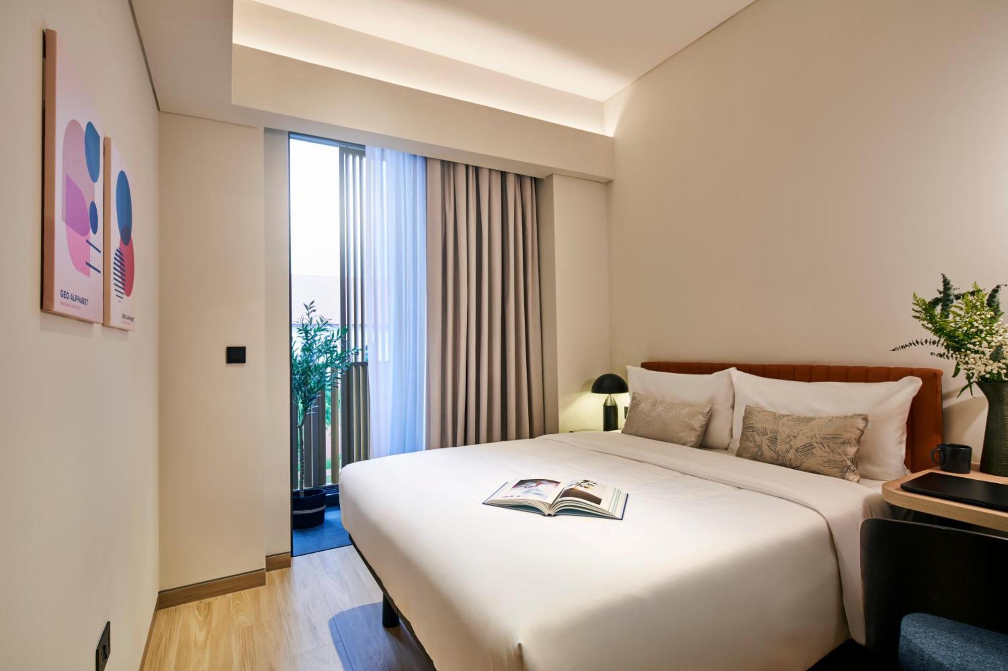 Four-Bedroom Apartment with Balcony